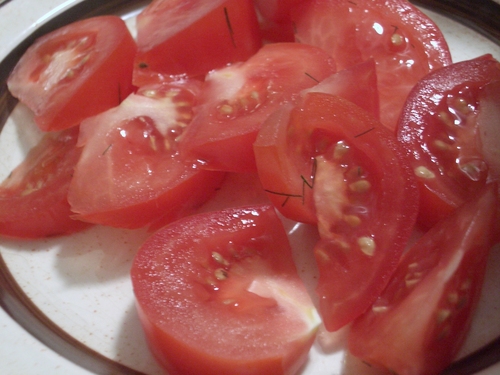[Picture: Sliced Tomato with herbs]
