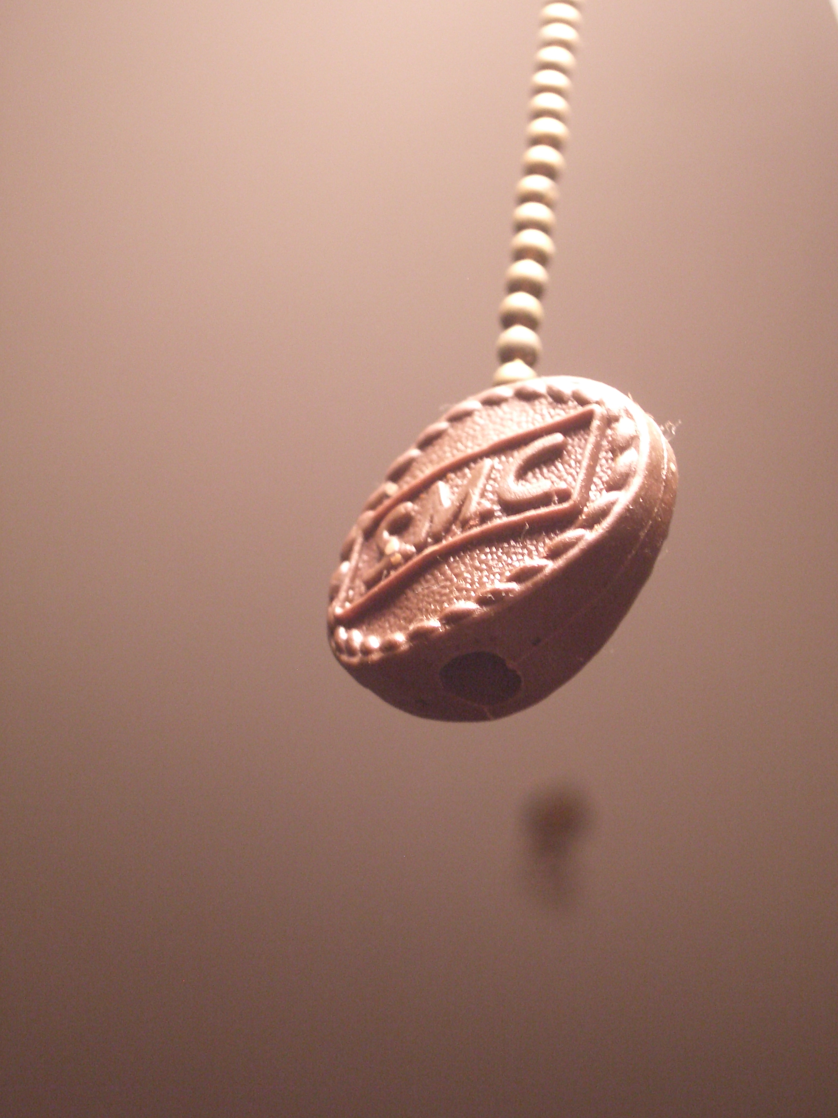 [Picture: Dangling pendant]