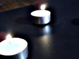 [picture: Two Tea lights]
