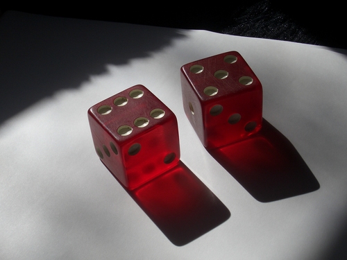 [Picture: Two translucent red dice]