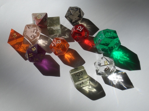 [Picture: coloured plastic gaming dice]