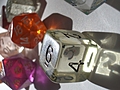 [Picture: coloured plastic gaming dice 3]