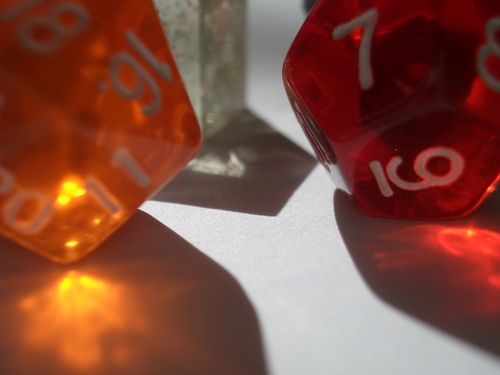 [Picture: coloured plastic gaming dice 5]