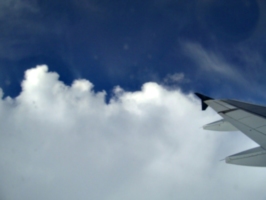 [picture: Clouds, blue sky, wing]