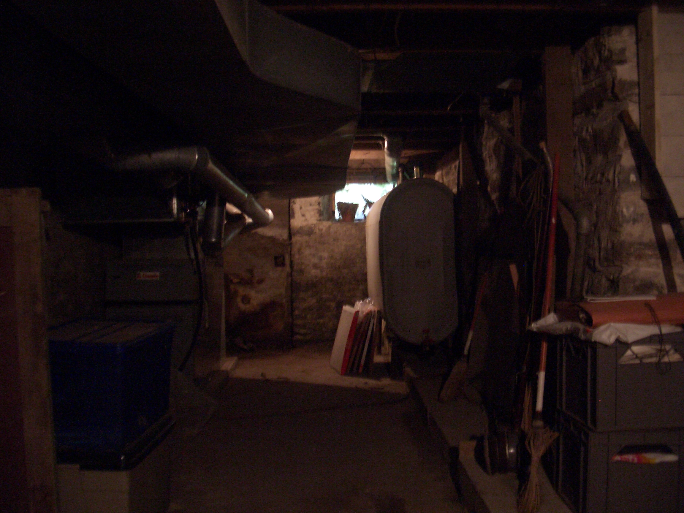 [Picture: basement with furnace]