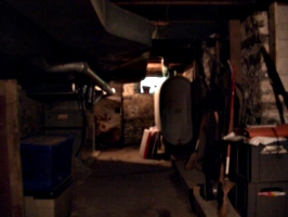 [Picture: basement with furnace]