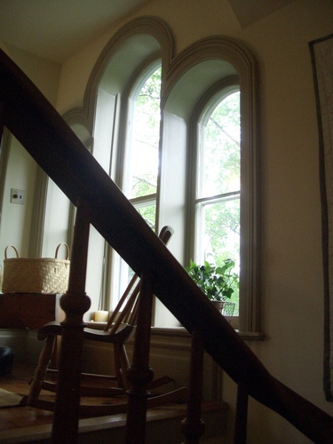 [Picture: Rounded windows with rocking chair]