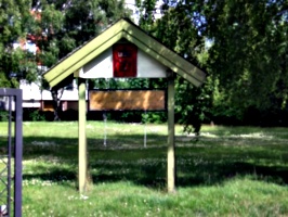 [picture: Blank sign board in a park]