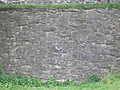 [Picture: Grey stone wall]