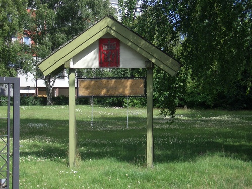 [Picture: Blank sign board in a park]