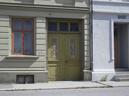 [Picture: Carved wooden doorway]