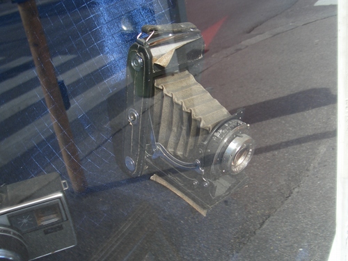 [Picture: Camera Shop Window]