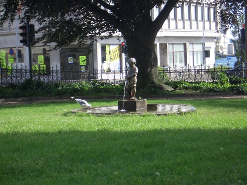 [Picture: statue of urinating boy]