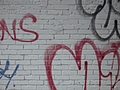 [Picture: Wall with graffiti]