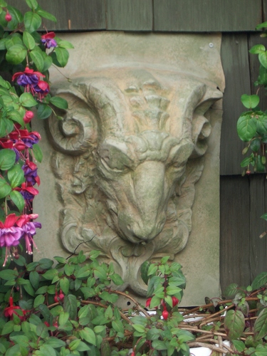 [Picture: Stone goat head]