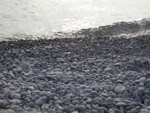 [Picture: Waves lapping the beach]