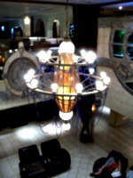 [picture: Hotel lobby chandelier from above]