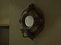 [Picture: Porthole Mirror with Candle 2]