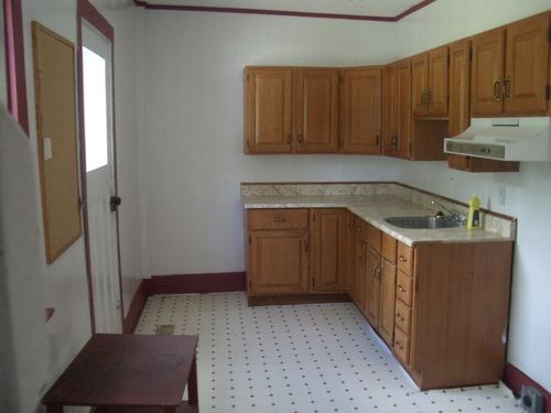 [Picture: Empty kitchen]