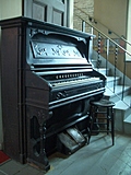 [Picture: Antique pedal organ]