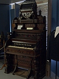 [Picture: Another antique pedal organ]