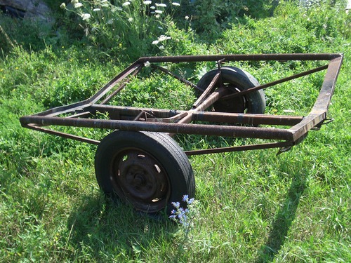 [Picture: Old boat trailer]