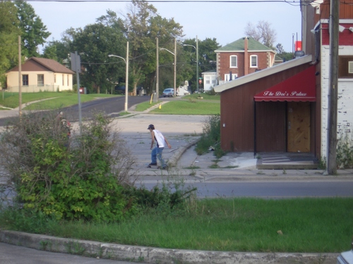 [Picture: Skateboarding youth]