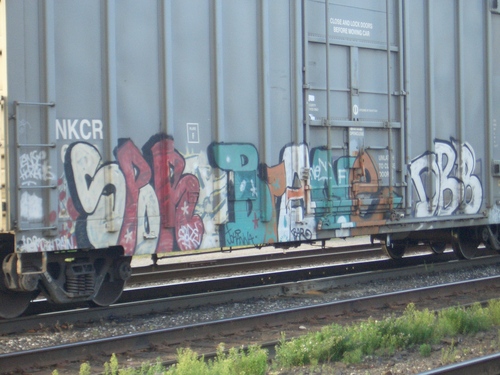 [Picture: Graffiti on railway truck]