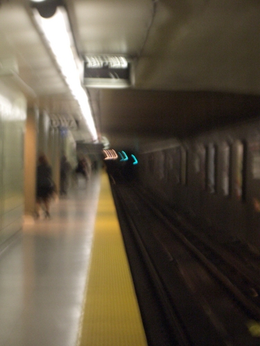 [Picture: Blurred subway station platform]