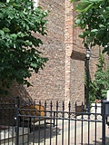 [Picture: Old brick wall and seat]