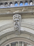 [Picture: Carved man’s face 2]
