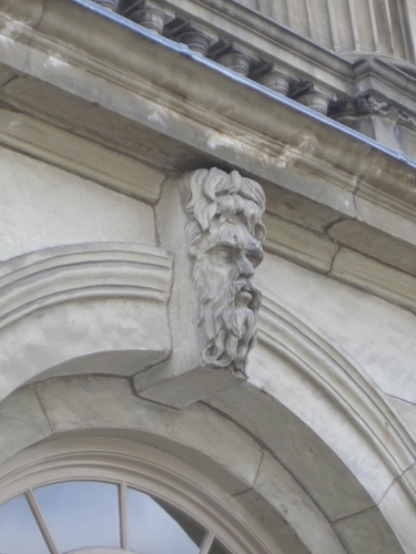 [Picture: Carved man’s face 3]