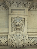 [Picture: Carved stone lion’s head]