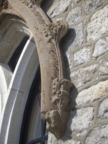 [Picture: Floral stone-carving on an arch]