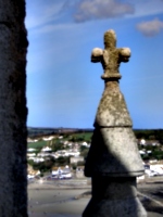 [Picture: Stone cross finial]