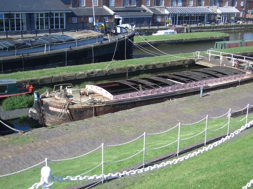 [Picture: Longboat in the lock]