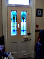 [picture: Front door with stained glass leads]