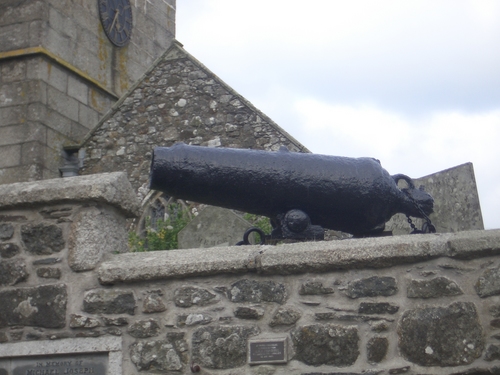 [Picture: Cannon on stone wall]