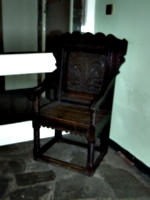 [picture: ornate carved chair]
