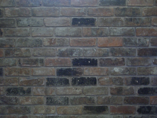 [Picture: hand-made brick wall]