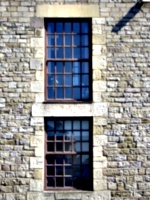 [picture: Sash windows in stone wall]