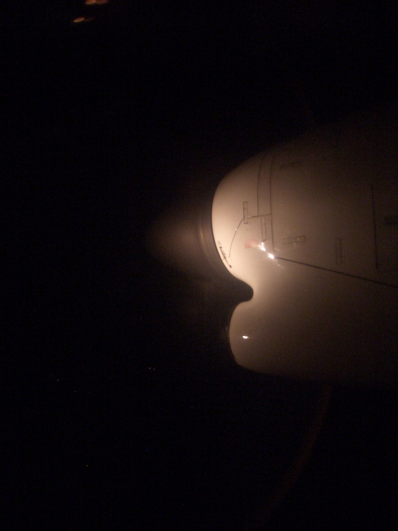 [Picture: Plane engine at night]