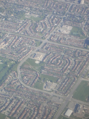 [Picture: Suburban Housing From Above]