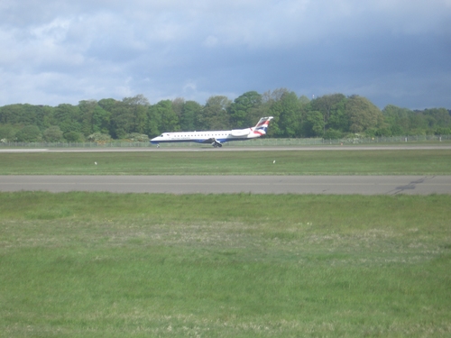 [Picture: Plane preparing to take off]