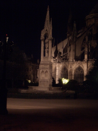 [Picture: By Notre Dame at night]