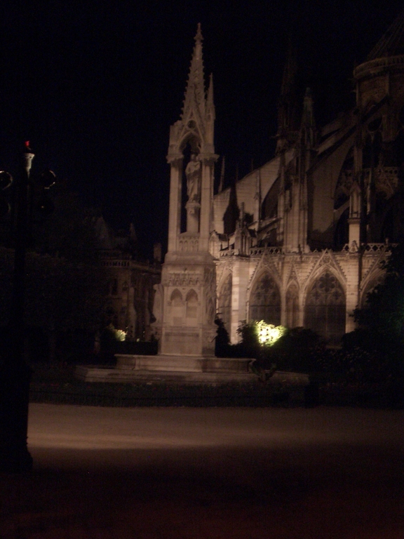 [Picture: By Notre Dame at night]