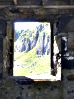 [picture: Cliff seen through old window 2]