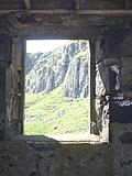 [Picture: Cliff seen through old window 2]