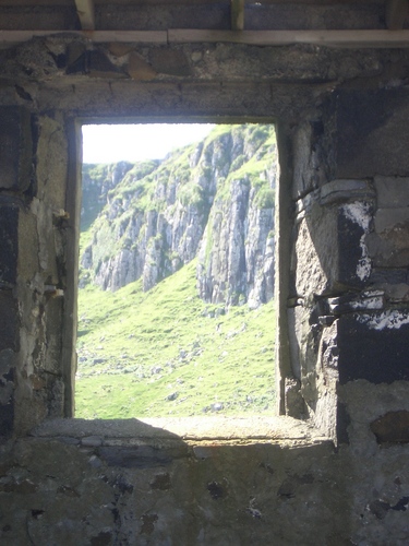 [Picture: Cliff seen through old window 2]