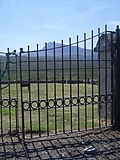 [Picture: Cemetary gates]